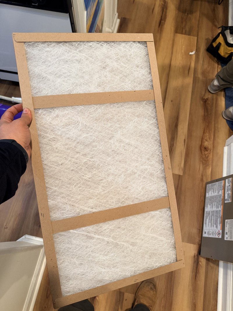 Air Casablanca HVAC technician performing maintenance on a heat pump in Myrtle Beach, SC.